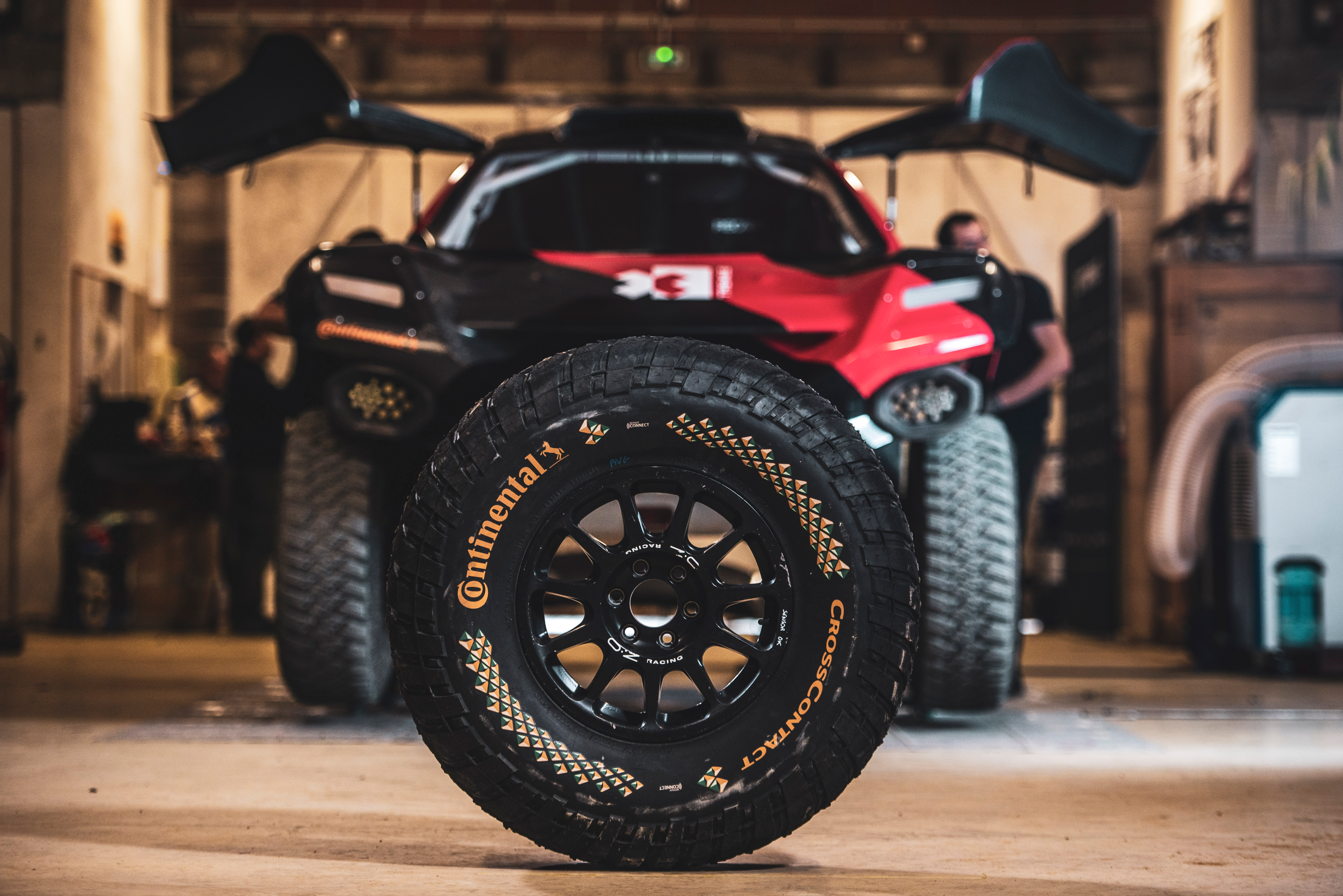 Continental Tire in front of a car