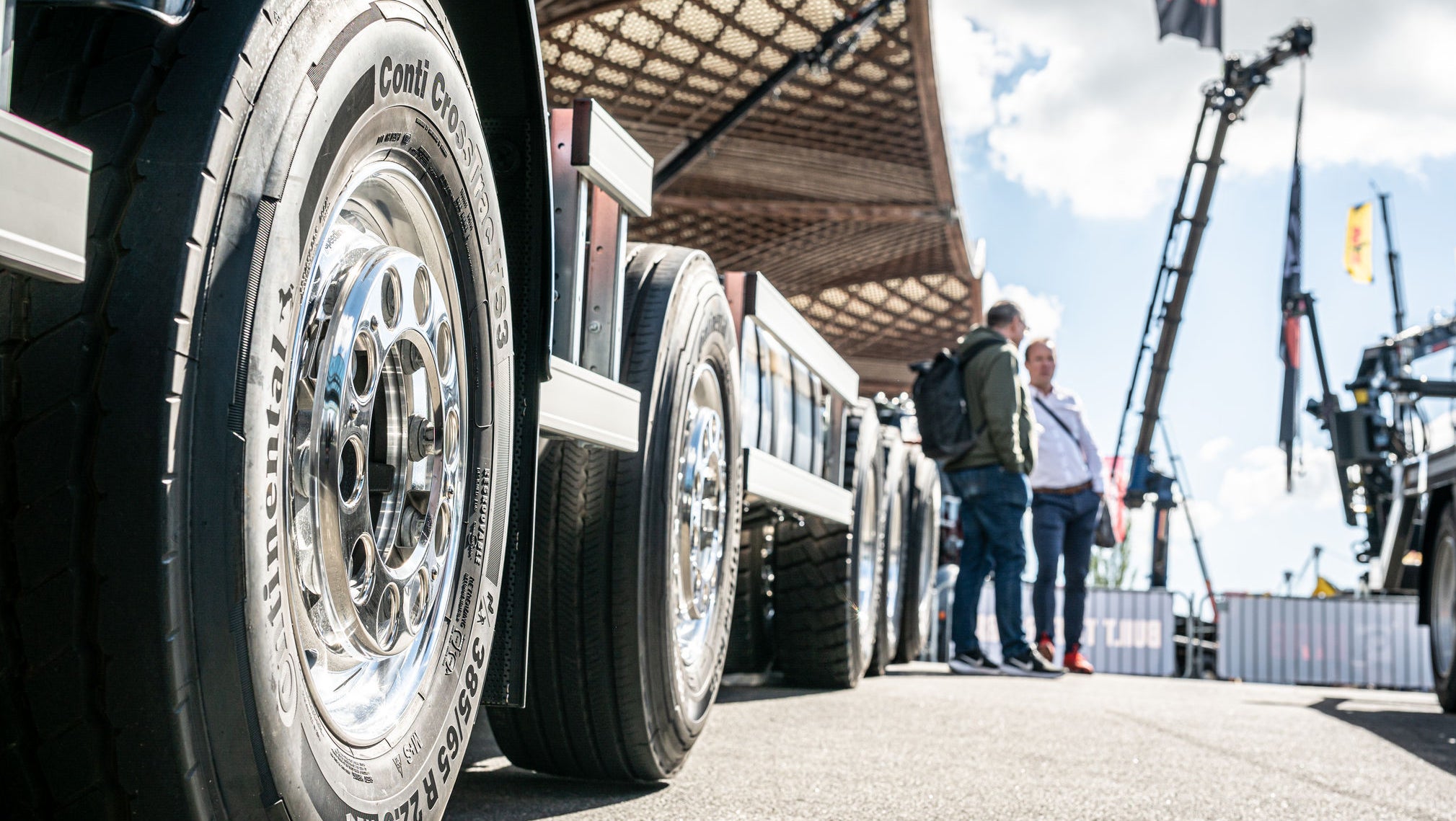 A close-up of a truck tire mounted on a truck 