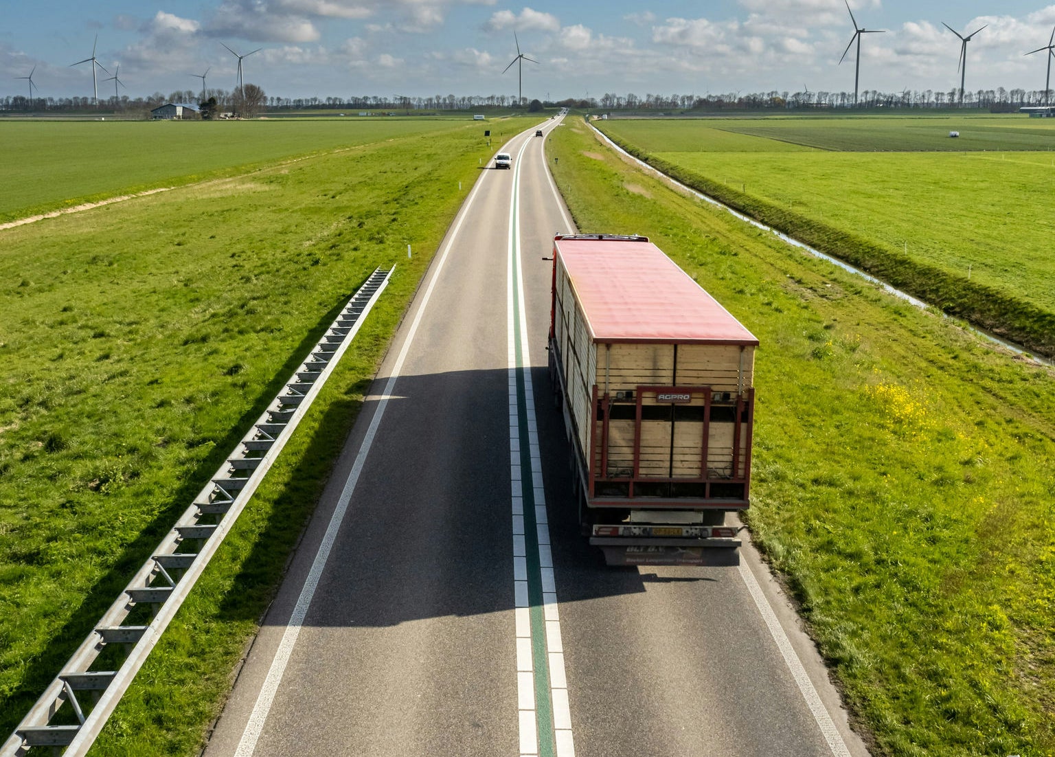 A truck on a green road 