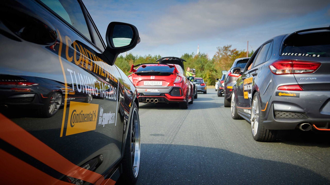 A group of cars in a race 